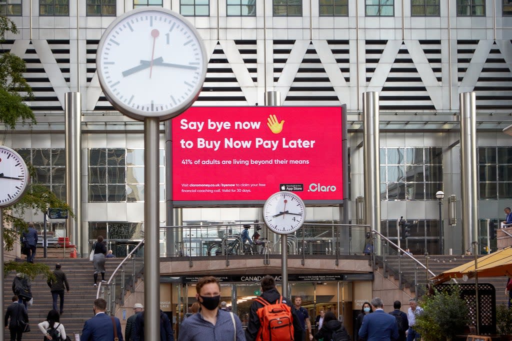  (Claro billboard at Canary Wharf)