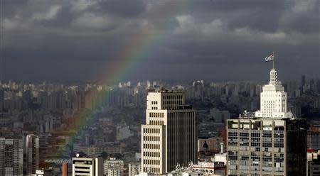 A rainbow appears over the sky of the city of Sao Paulo April 24, 2014. Sao Paulo is one of the host cities for the 2014 soccer World Cup in Brazil. REUTERS/Paulo Whitaker