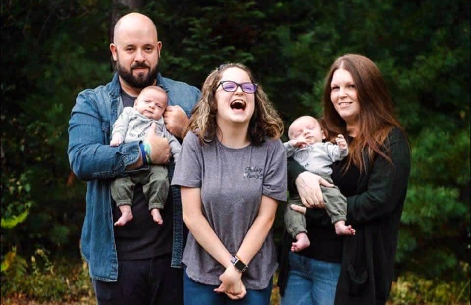 15-year-old Chloe Selig with her mother and caregiver Laura Dill, step-father Doug Ralph and baby brothers. 