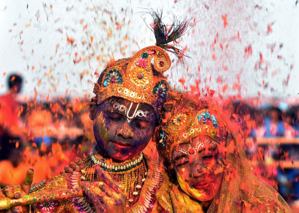 Hindus celebrate Holi, the festival of colors