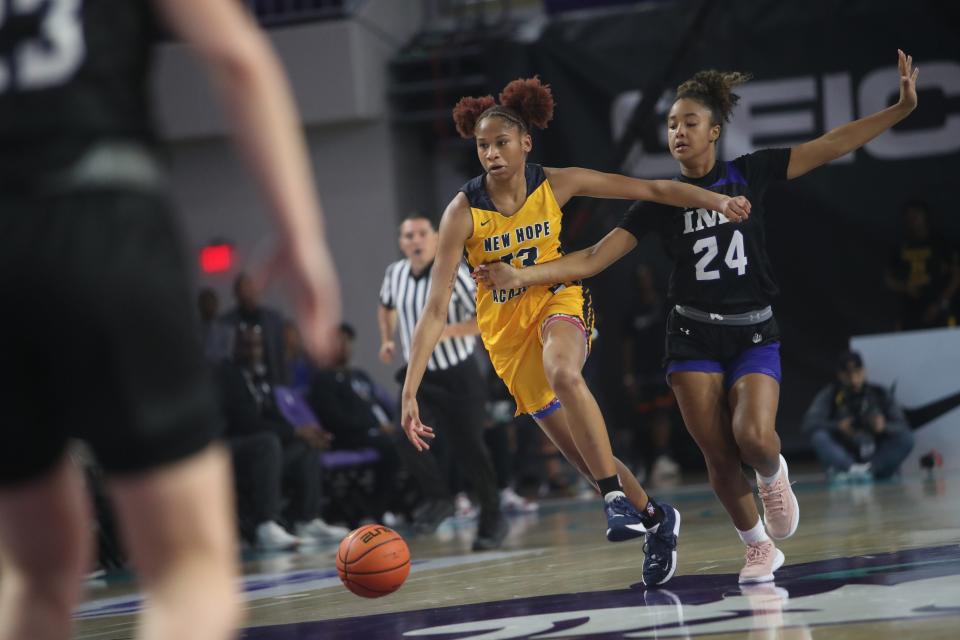 Scenes from  New Hope (MD) girls basketball  semi final game against IMG Academy during the Geico High School Nationals at Suncoast Arena at FSW on Friday, April 1, 2022. New Hope won and moves onto the finals.  