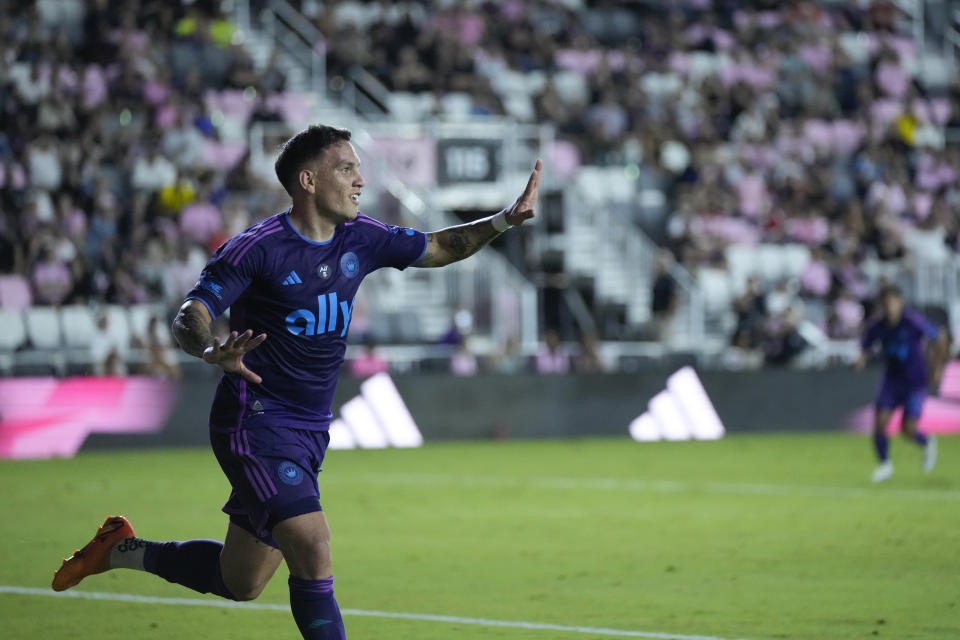 Charlotte FC forward Enzo Copetti (9) runs as he celebrates scoring his side's first goal against Inter Miami during the first half of an MLS soccer match, Wednesday, Oct. 18, 2023, in Fort Lauderdale, Fla. (AP Photo/Rebecca Blackwell)