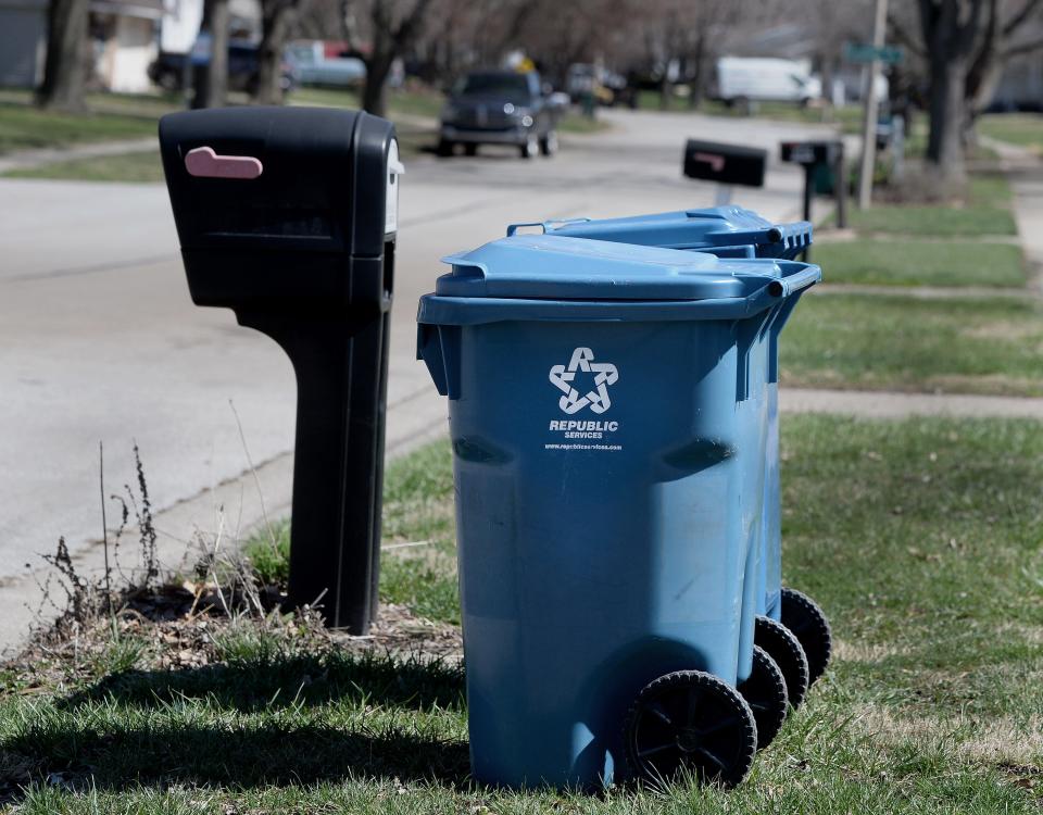 Republic Service garbage cans are seen on Black Avenue Friday, March 15, 2024, in Springfield.