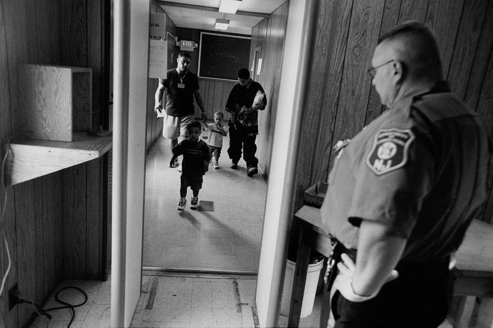 <span class="caption">A family enters a women’s prison in New Jersey to visit their mother.</span> <span class="attribution"><a class="link " href="https://www.gettyimages.com/detail/news-photo/family-enters-a-womens-prison-in-new-jersey-to-visit-their-news-photo/539606566?adppopup=true" rel="nofollow noopener" target="_blank" data-ylk="slk:Andrew Lichtenstein/Corbis via Getty Images;elm:context_link;itc:0;sec:content-canvas">Andrew Lichtenstein/Corbis via Getty Images</a></span>