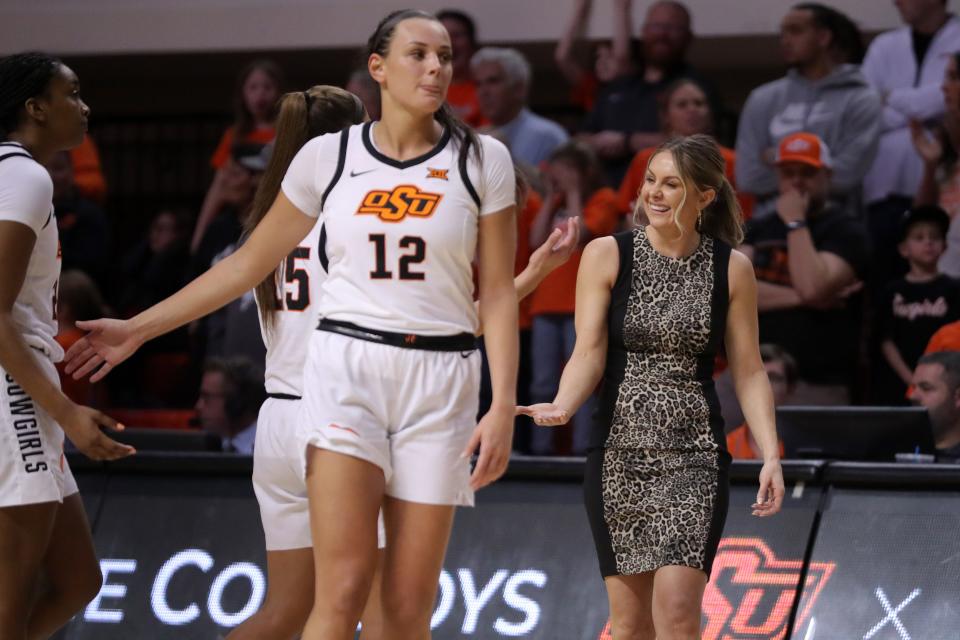 Oklahoma State Cowgirls head coach Jacie Hoyt celebrates during a women's college basketball game between the Oklahoma State Cowgirls (OSU) and the Iowa State Cyclones at Gallagher-Iba Arena in Stillwater, Okla., Wednesday, Feb. 22, 2023. Oklahoma State won 73-68.