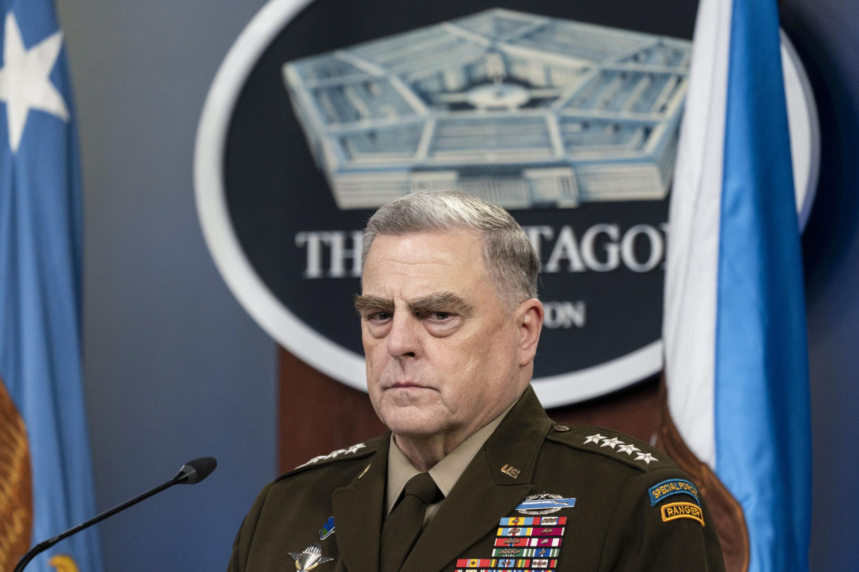 Joint Chiefs Chairman Gen. Mark Milley listens during a media briefing at the Pentagon on Friday.