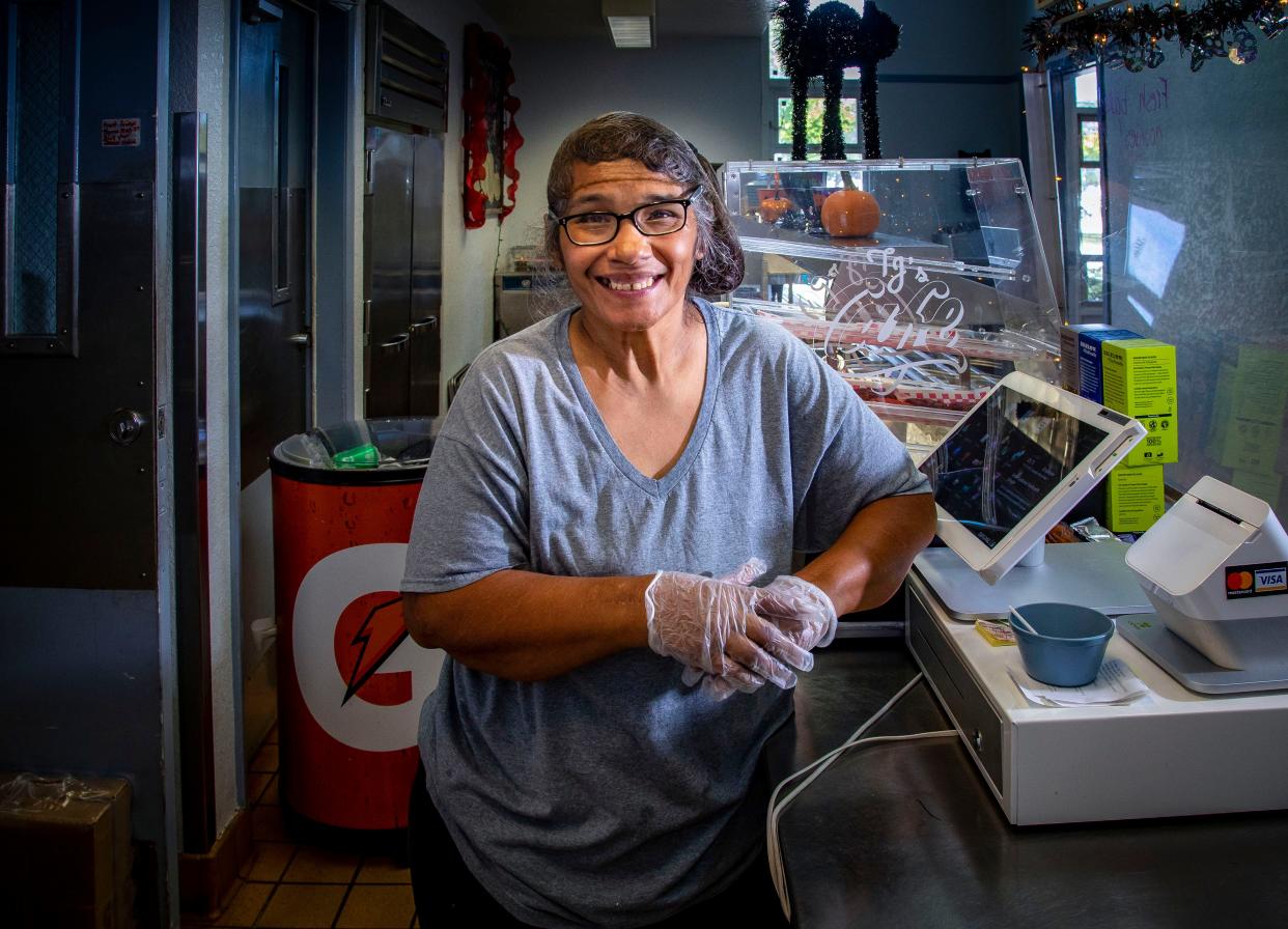 Barbara Hutchison, a grocery store clerk who lost her job during the pandemic, now works in the ARC cafeteria at the Palm Beach Habilitation Center. She needs multiple surgeries and faces homelessness as her stay at the West Palm Beach shelter comes to an end.