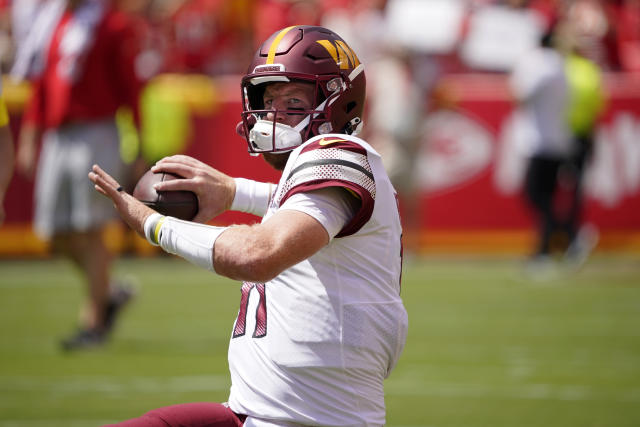 Washington Commanders quarterback Carson Wentz (11) in action during the  first half of a preseason NFL football game against the Carolina Panthers,  Saturday, Aug. 13, 2022, in Landover, Md. (AP Photo/Nick Wass