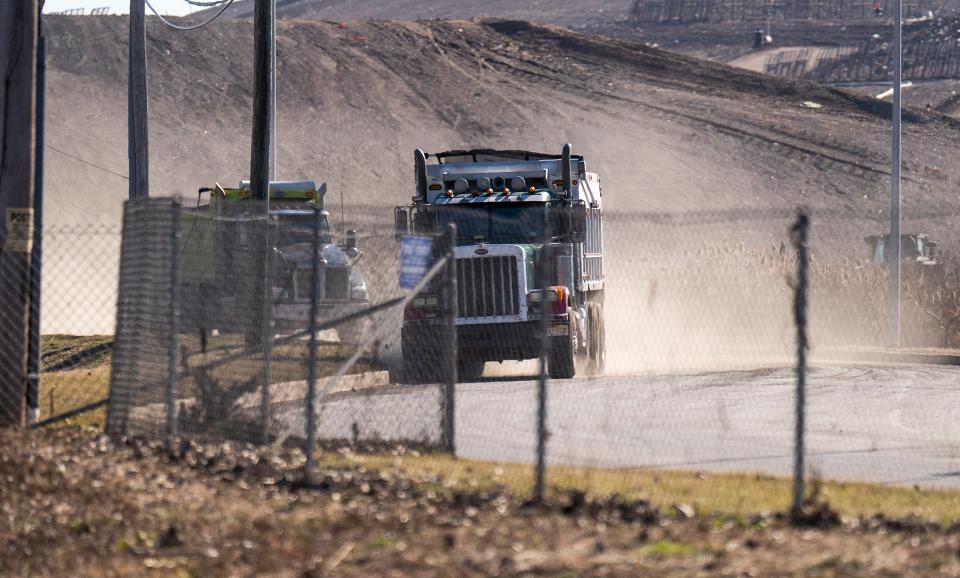 Trucks drive out of the construction site on S.Steel Rd. in Morrisville on Tuesday, Feb. 6, 2024.

Daniella Heminghaus | Bucks County Courier Times