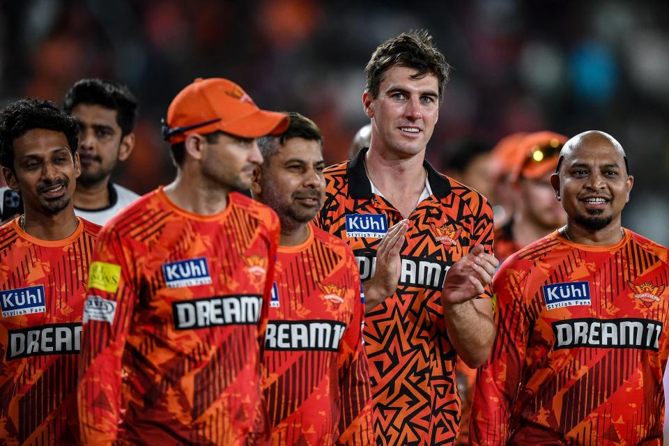 Sunrisers Hyderabad's captain Pat Cummins (C) greets supporters after his team's win in the Indian Premier League (IPL) Twenty20 cricket match between Sunrisers Hyderabad and Punjab Kings at the Rajiv Gandhi International Stadium in Hyderabad on May 19, 2024.