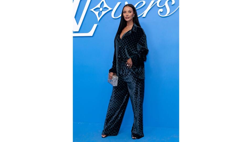 Maya Jama attends the Louis Vuitton Menswear Spring/Summer 2025 show as part of Paris Fashion Week on June 18 in a matching velvet suit