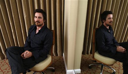 British actor Christian Bale poses for a portrait while promoting his upcoming movie "Out of the Furnace" in Los Angeles, California November 16, 2013. REUTERS/Mario Anzuoni