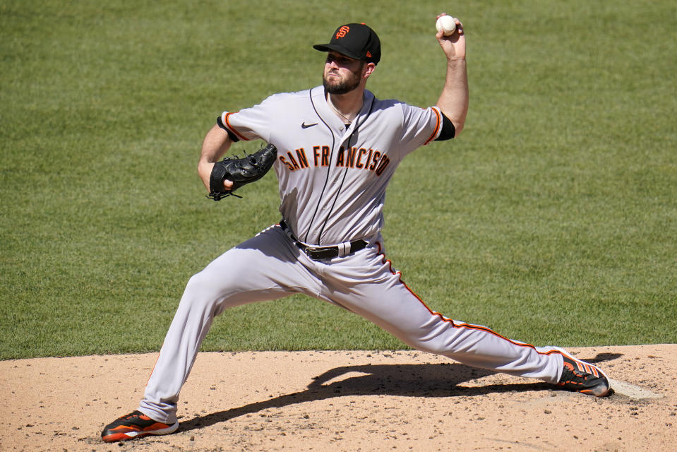 San Francisco Giants starting pitcher Alex Wood delivers during the fourth inning of a baseball game against the Pittsburgh Pirates in Pittsburgh, Saturday, June 18, 2022. (AP Photo/Gene J. Puskar)