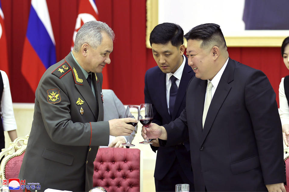 In this photo provided by the North Korean government, North Korean leader Kim Jong Un, right, and Russian Defense Minister Sergei Shoigu, left, toast at a banquet hall of the ruling Workers’ Party’s headquarters in Pyongyang, North Korea Thursday, July 27, 2023. Independent journalists were not given access to cover the event depicted in this image distributed by the North Korean government. The content of this image is as provided and cannot be independently verified. Korean language watermark on image as provided by source reads: "KCNA" which is the abbreviation for Korean Central News Agency. (Korean Central News Agency/Korea News Service via AP)