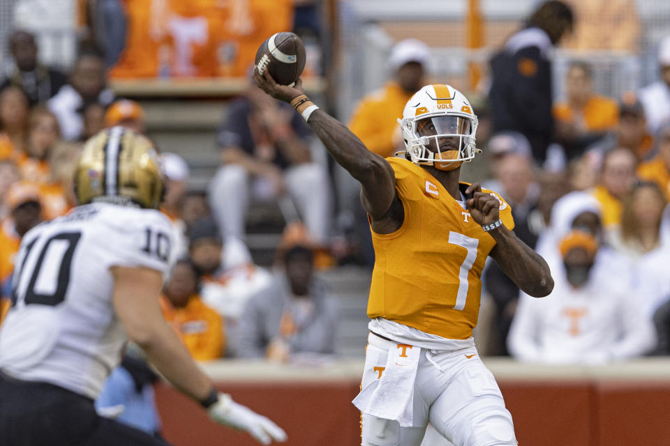 Tennessee quarterback Joe Milton III (7) throws to a receiver during the first half of an NCAA college football game against Vanderbilt Saturday, Nov. 25, 2023, in Knoxville, Tenn. (AP Photo/Wade Payne)