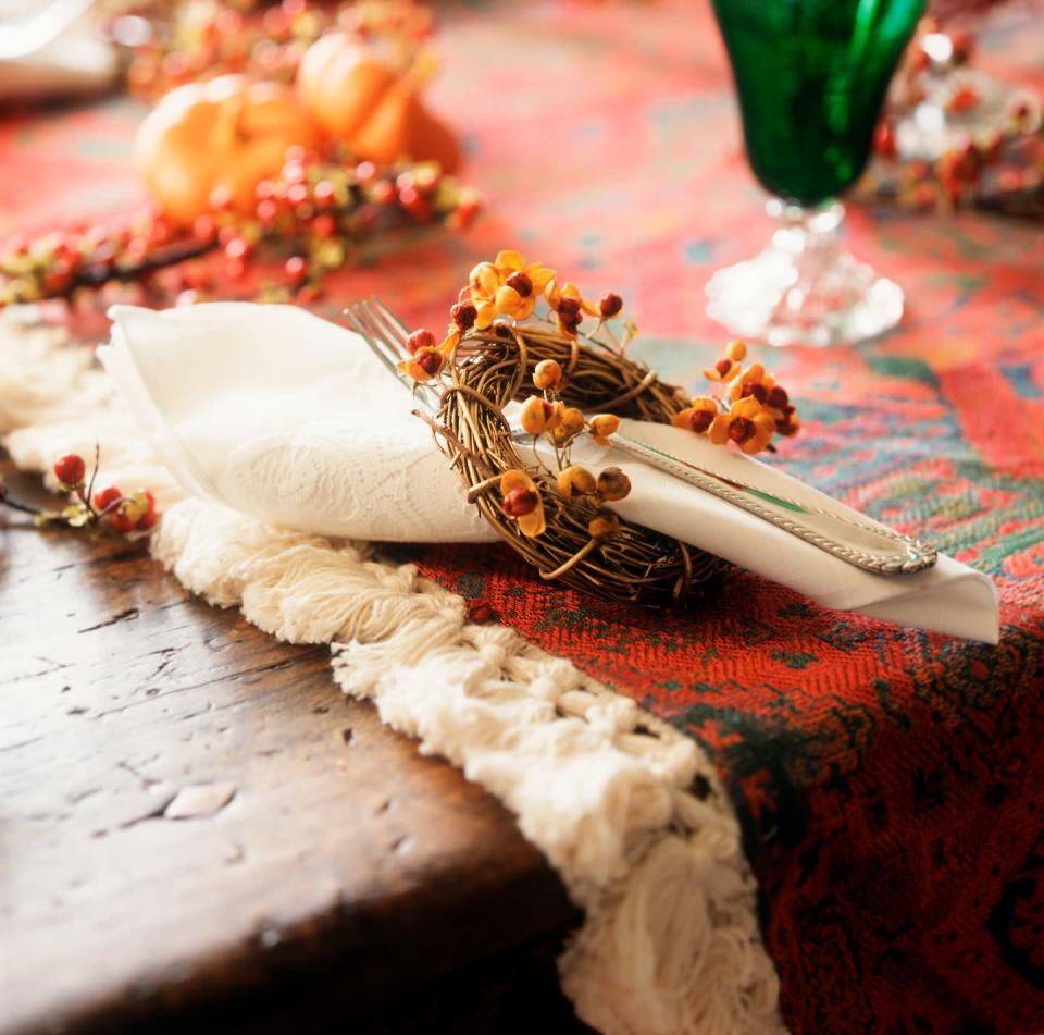 <p>Need a no-fuss way to elevate your fall dinner table? Go for grapevine wreath napkin rings, which are pretty enough to use well into the holiday season.</p>