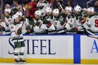 Nov 11, 2018; St. Louis, MO, USA; Minnesota Wild right wing Mikael Granlund (64) is congratulated by teammates after scoring during the third period against the St. Louis Blues at Enterprise Center. Jeff Curry-USA TODAY Sports