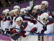 Team USA watches late in the third period against Canada during a men's semifinal ice hockey game at the 2014 Winter Olympics, Friday, Feb. 21, 2014, in Sochi, Russia. Canada won 1-0. (AP Photo/Petr David Josek)