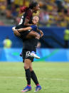 <p>United States’ Crystal Dunn, top, celebrates scoring her side’s first goal with teammate Christen Press during a group G match of the women’s Olympic football tournament between Colombia and United States at the Arena Amazonia stadium in Manaus, Brazil, Tuesday, Aug. 9, 2016. The game ended in a 2-2 draw. (AP Photo/Michael Dantas) </p>