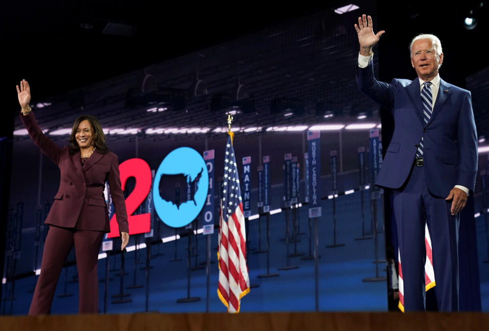 Democratic presidential candidate and former Vice President Joe Biden waves next to U.S. Senator Kamala Harris (D-CA) after she accepted the Democratic vice presidential nomination during an acceptance speech delivered for the largely virtual 2020 Democratic National Convention from the Chase Center in Wilmington, Delaware, U.S., August 19, 2020. (Kevin Lamarque/Reuters)