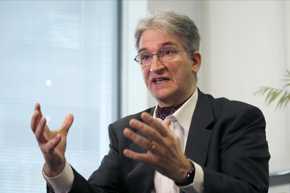 Jacques Deguest, an expert on Japanese law and business, talks during an Associated Press interview Thursday, Jan. 9, 2020, in Tokyo. In a news conference in Beirut, Nissan's former Chairman Carlos Ghosn lambasted Japan's justice system, calling it rigged and unfair, pointing to the prolonged detention and the hours of questioning that tend to coerce confessions. Legal experts say such treatment is not unusual and fear a backlash in tighter bail conditions. (AP Photo/Kiichiro Sato)