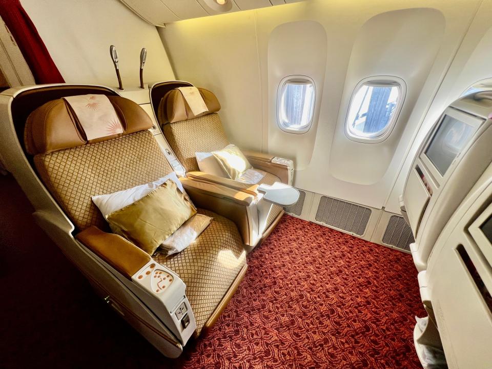 Air India's legacy business class, 2x3x2 with yellow seats.