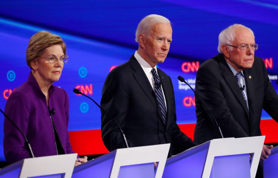 Sen. Elizabeth Warren, former Vice President Joe Biden and Sen. Bernie Sanders participate in the seventh Democratic presidential debate in Des Moines, Iowa, on Jan. 14, 2020. (Photo: Shannon Stapleton / Reuters)