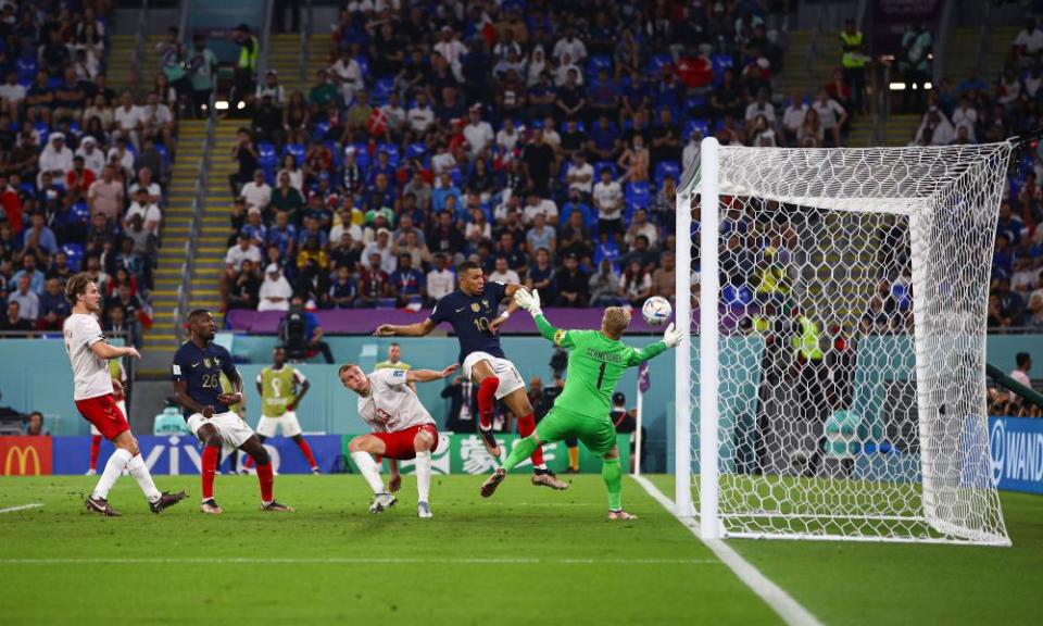 Kylian Mbappé scores his second goal of the game for France