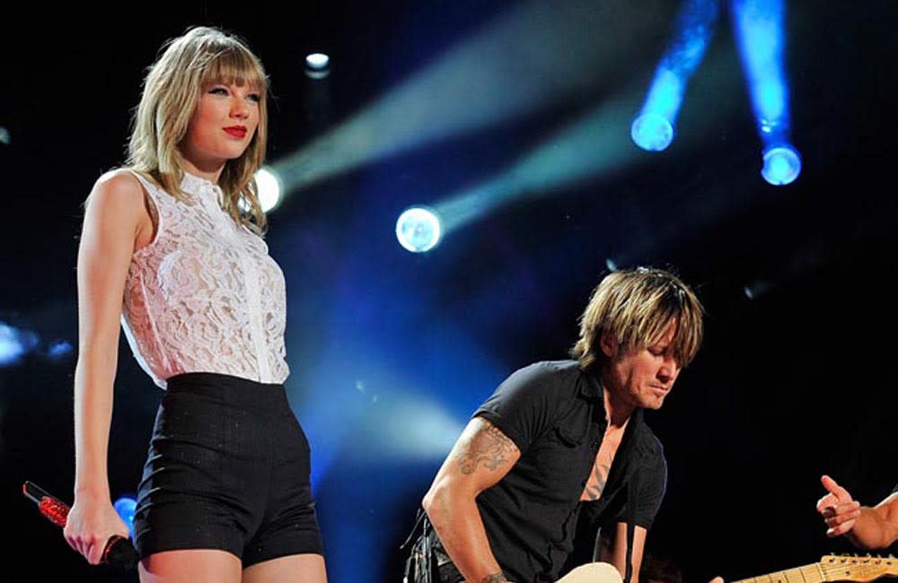 Keith Urban is addicted to Ariana Grande's latest hit and loves Taylor Swift's new album credit:Bang Showbiz