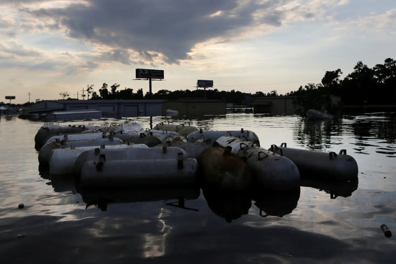 Flood waters from Tropical Storm Harvey surround propane tanks in Rose City, Texas