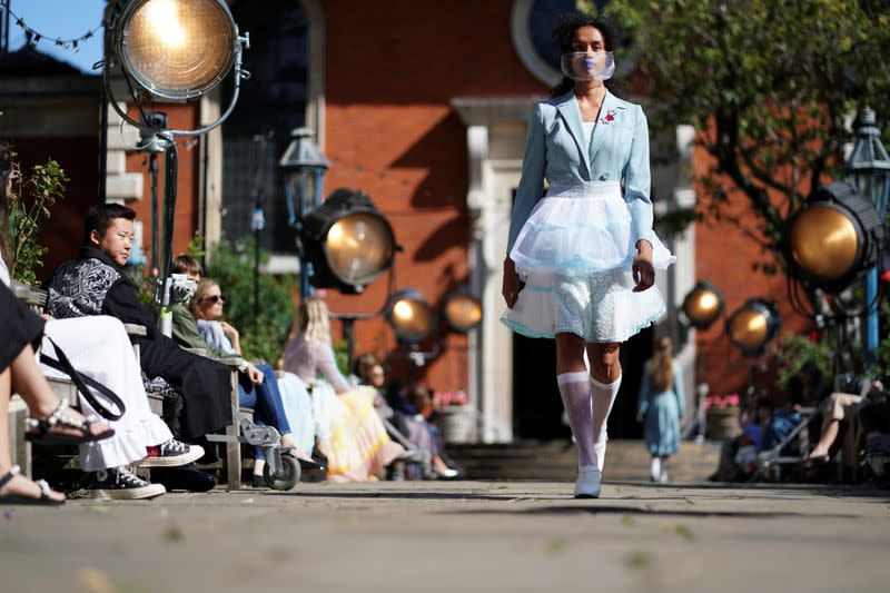 Models present creations during the Bora Aksu catwalk show at London Fashion Week 2020, in London