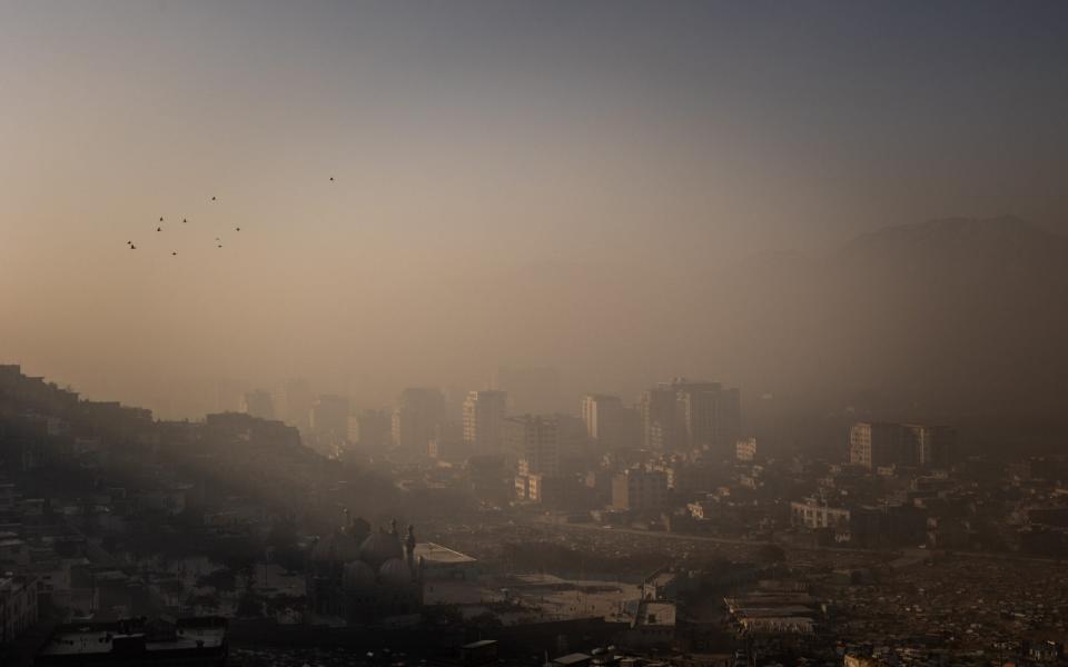 A layer of smog covering Kabul - Jim Huylebroek