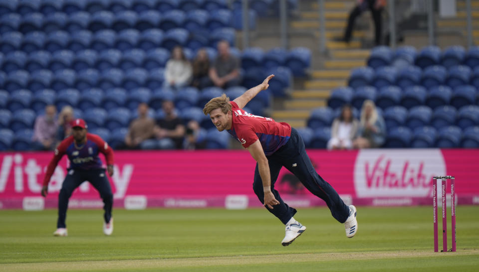 England's David Willey, Bowles to Sri Lanka's Avishka Fernando, during the second T20 international cricket match between England and Sri Lanka in Cardiff, Wales, Thursday, June 24, 2021. (AP Photo/Alastair Grant)