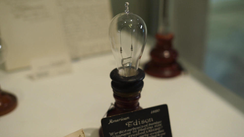 An 1880 Edison light bulb - his first commercial artificial lamp.  / Credit: CBS News