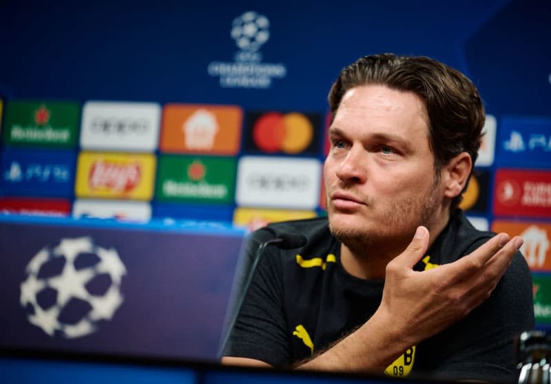 Coach Edin Terzic takes part in the press conference ahead of Wednesday's UEFA Champions League semi-final match between Borussia Dortmund and Paris Saint-Germain. Bernd Thissen/dpa