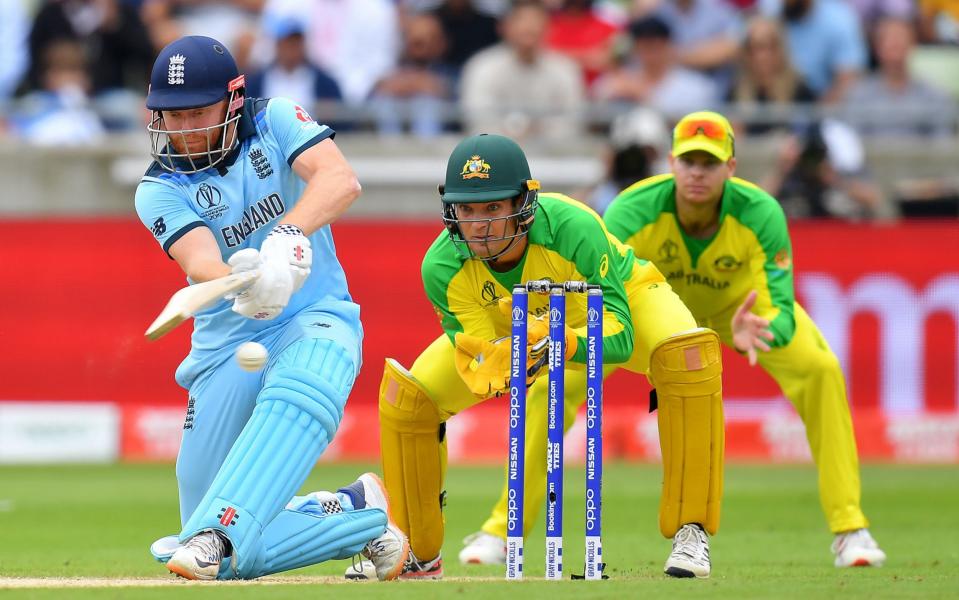 Jonny Bairstow slog-sweeps the ball for four against Australia - GETTY IMAGES