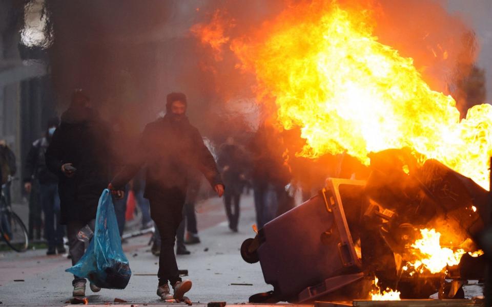 Covid latest news: Germans will be 'vaccinated, cured or dead' by winter's end, warns health minister - KENZO TRIBOUILLARD /AFP