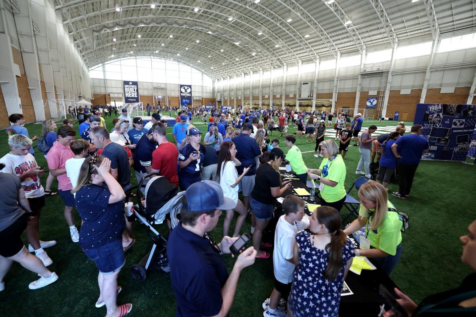 Fans crowd into the Indoor Practice Facility as BYU holds a party to celebrate their move into the Big 12 Conference with music, games and sports exhibits in Provo on Saturday, July 1, 2023. | Scott G Winterton, Deseret News