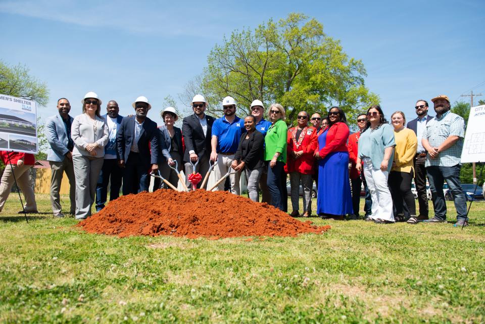 Community members pose for a photo as they commemorate the Men's Homeless Shelter groundbreaking in Jackson Tenn. on Wednesday, Apr. 19, 2023. 