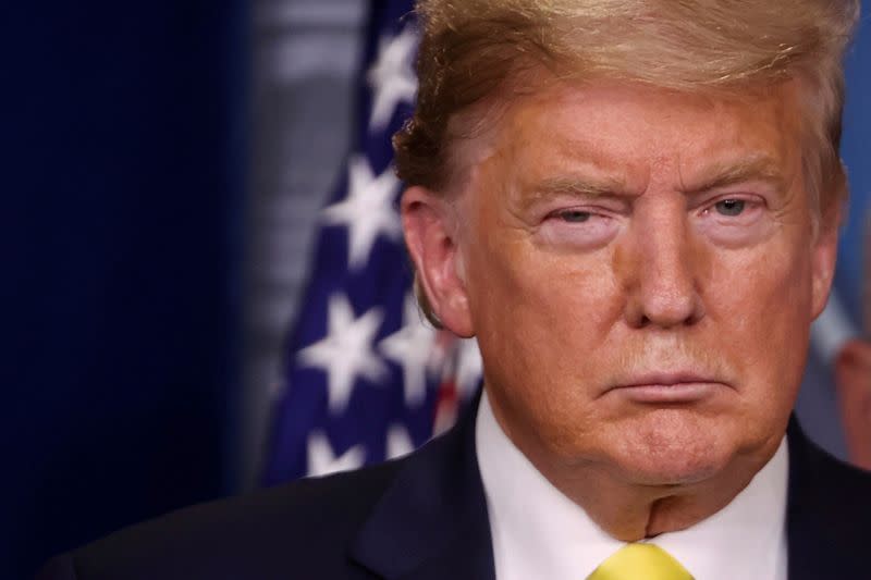 FILE PHOTO: U.S. President Donald Trump leads the daily Coronavirus-related briefing at the White House in Washington