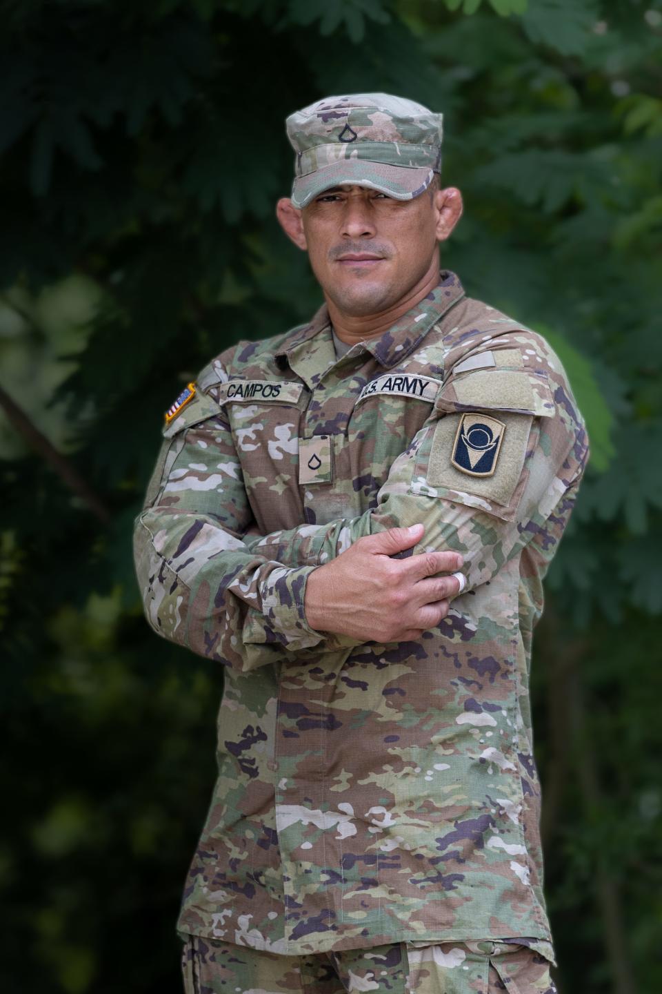 Alabama National Guard Pfc. Elioenai Campos poses for a photo wearing his U.S. Army uniform in Columbiana, Alabama, June 10, 2022. Campos is part of the United States national jiu-jitsu team set to compete for international honors at the World Games in Birmingham, Alabama.