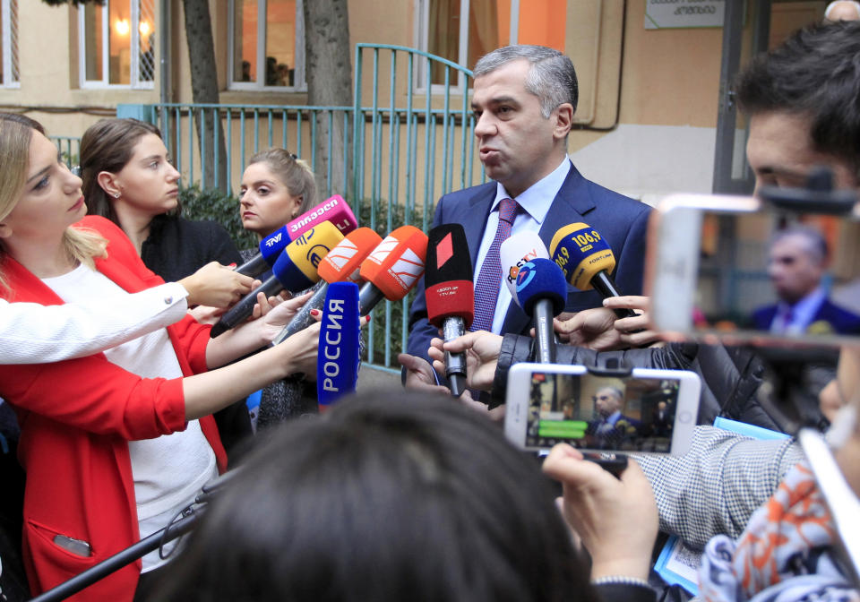 David Bakradze, presidential candidate from the European Georgia Party speaks to the media outside polling station in Tbilisi, Georgia, Sunday, Oct. 28, 2018 . Sunday's election will be the last time residents of the former Soviet republic of Georgia get to cast a ballot for president, that's if any of the 25 candidates gets an absolute majority. (AP Photo/Shakh Aivazov)