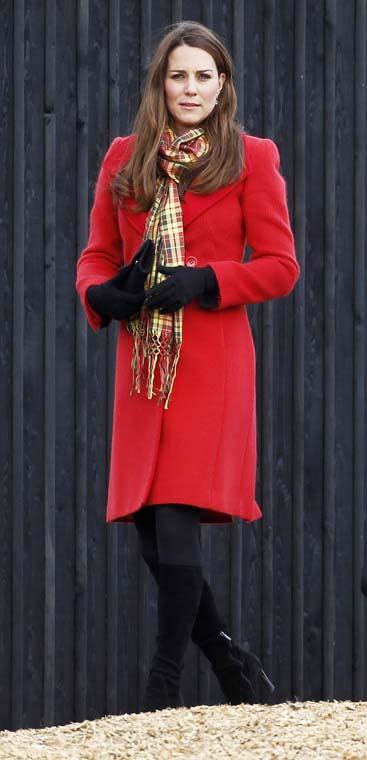 Kate braved the cold weather in March 2013 to attend the opening of an outdoor centre in Scotland wearing a red coat and black gloves.