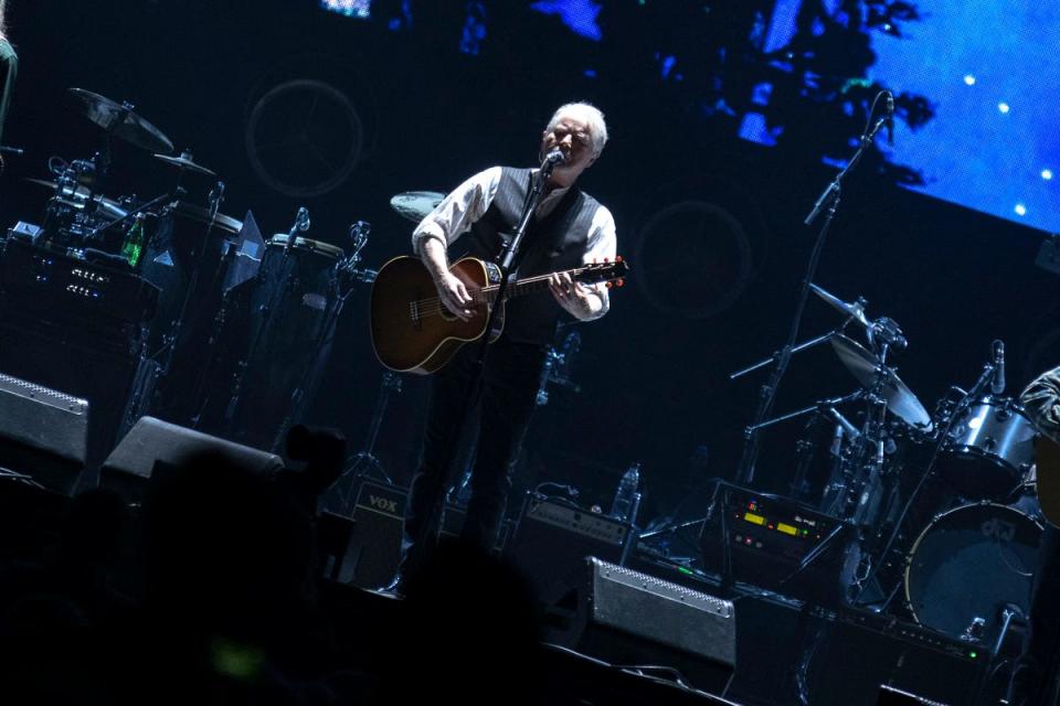 Don Henley strumming and singing during The Eagles farewell tour at PPG Paints Arena on Sunday.