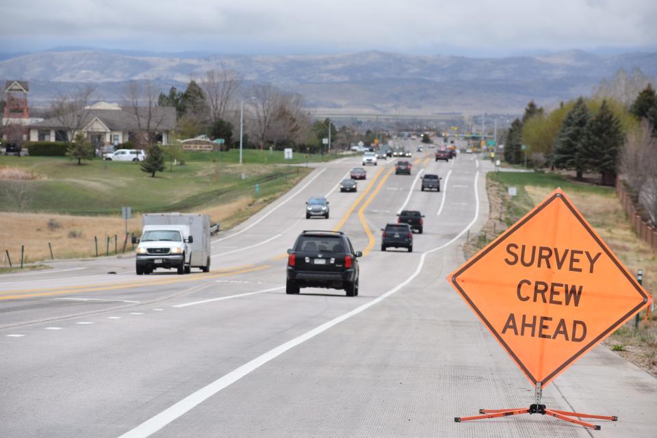 A sign warns drivers traveling on Colorado Highway 392 near Highland Meadows Parkway in west Windsor Monday of crews collecting data for future widening of the highway.