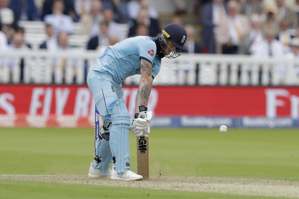 England's Ben Stokes is bowled out by a yorker from Australia's Mitchell Starc during the Cricket World Cup match between England and Australia at Lord's cricket ground in London, Tuesday, June 25, 2019. (AP Photo/Matt Dunham)