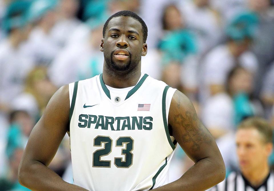 January 21, 2012; East Lansing, MI, USA; Michigan State Spartans forward Draymond Green (23) looks on during time out at Jack Breslin Students Events Center. MSU won 83-58.  Mandatory Credit: Mike Carter-USA TODAY Sports