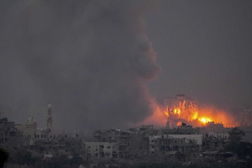 Smoke and fire rise following an Israeli airstrike in the Gaza Strip, as seen from southern Israel, October 2023