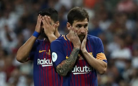 Leo Messi and Luis Suarez - Credit: REUTERS