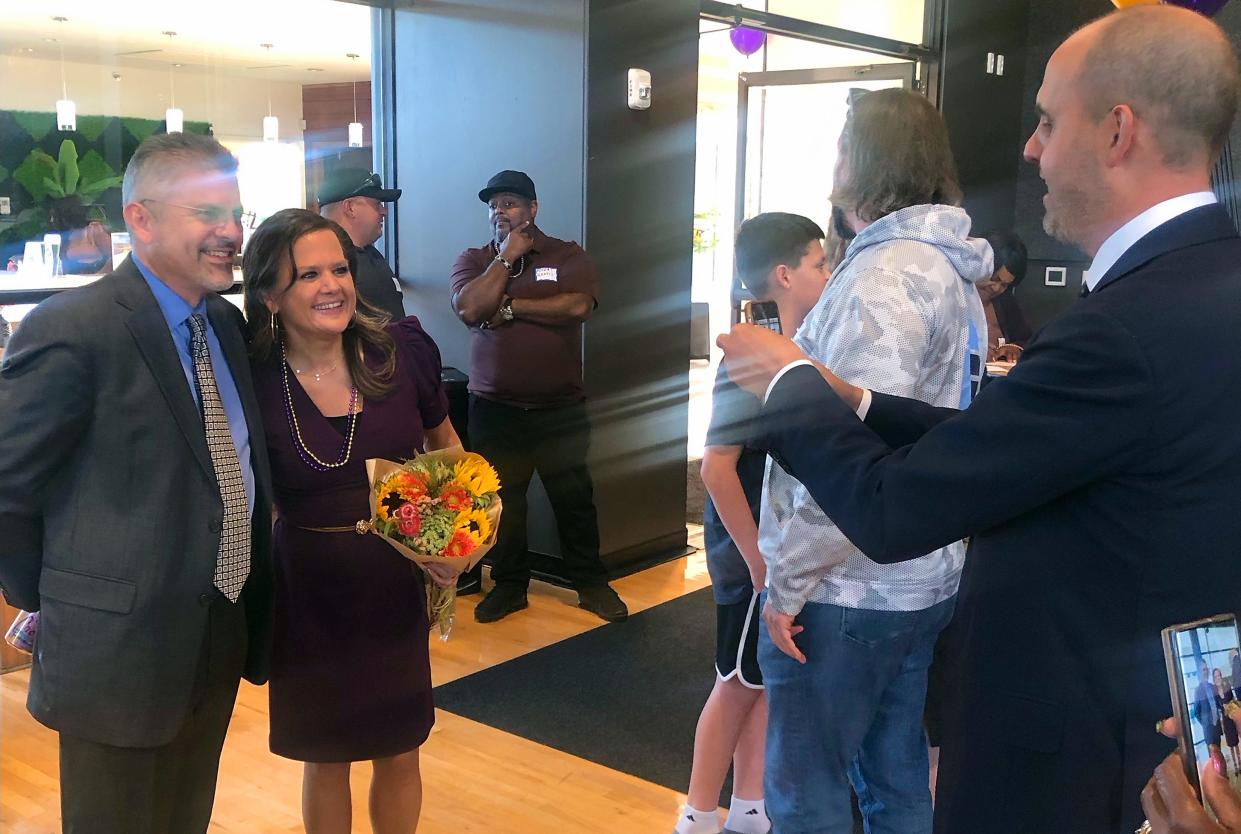 State 23rd District Rep. Tarra Simmons, center, poses with Washington State Supreme Court Justice Steven Gonzales, for a photo taken by State 23rd District Sen. Drew Hansen, during a celebration Friday at the Marvin Williams Center in Bremerton. Earlier that afternoon Simmons had her criminal history vacated through the New Hope Act.